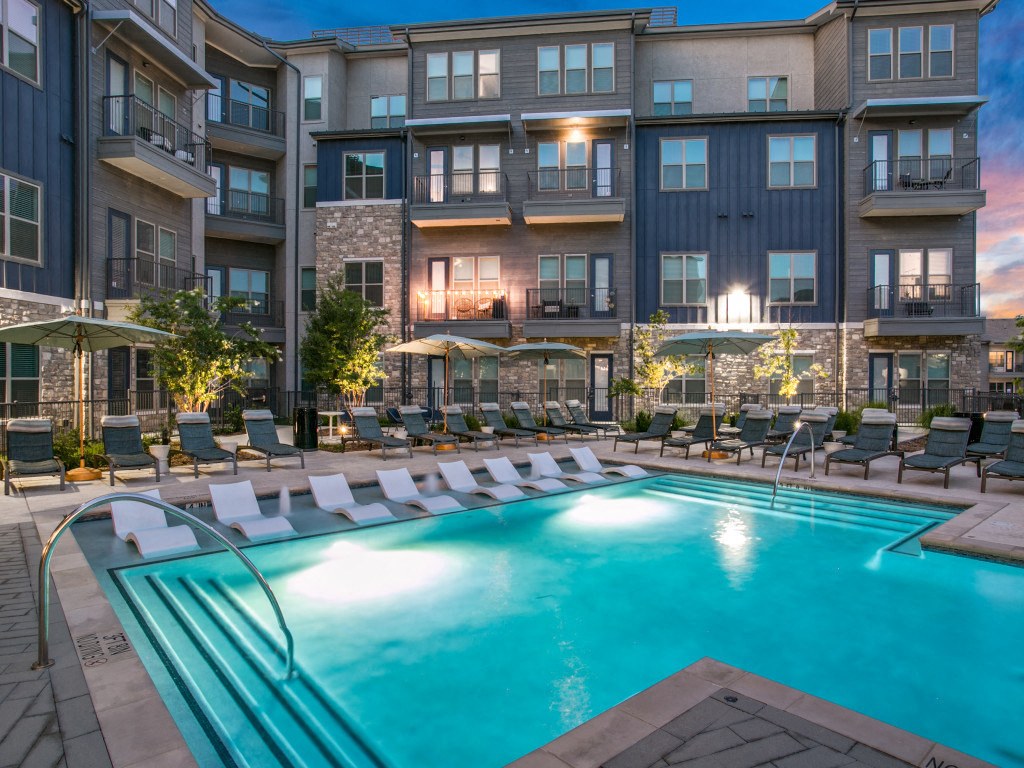 Resort-style pool at dusk